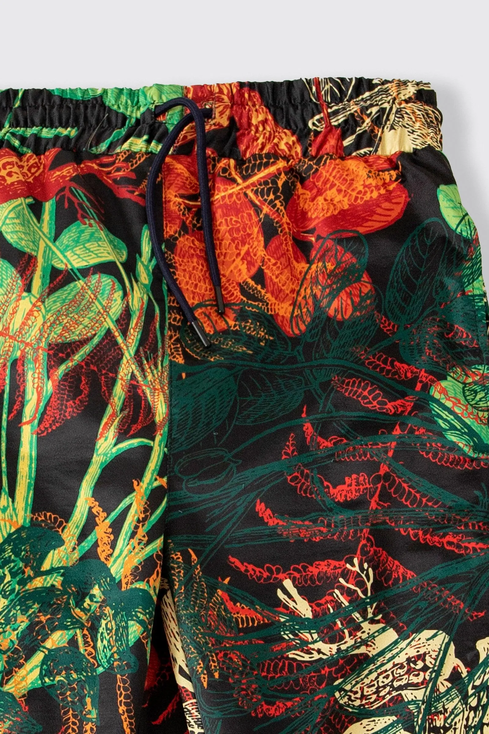 JUNGLE PRINTED SATIN SWEATPANTS