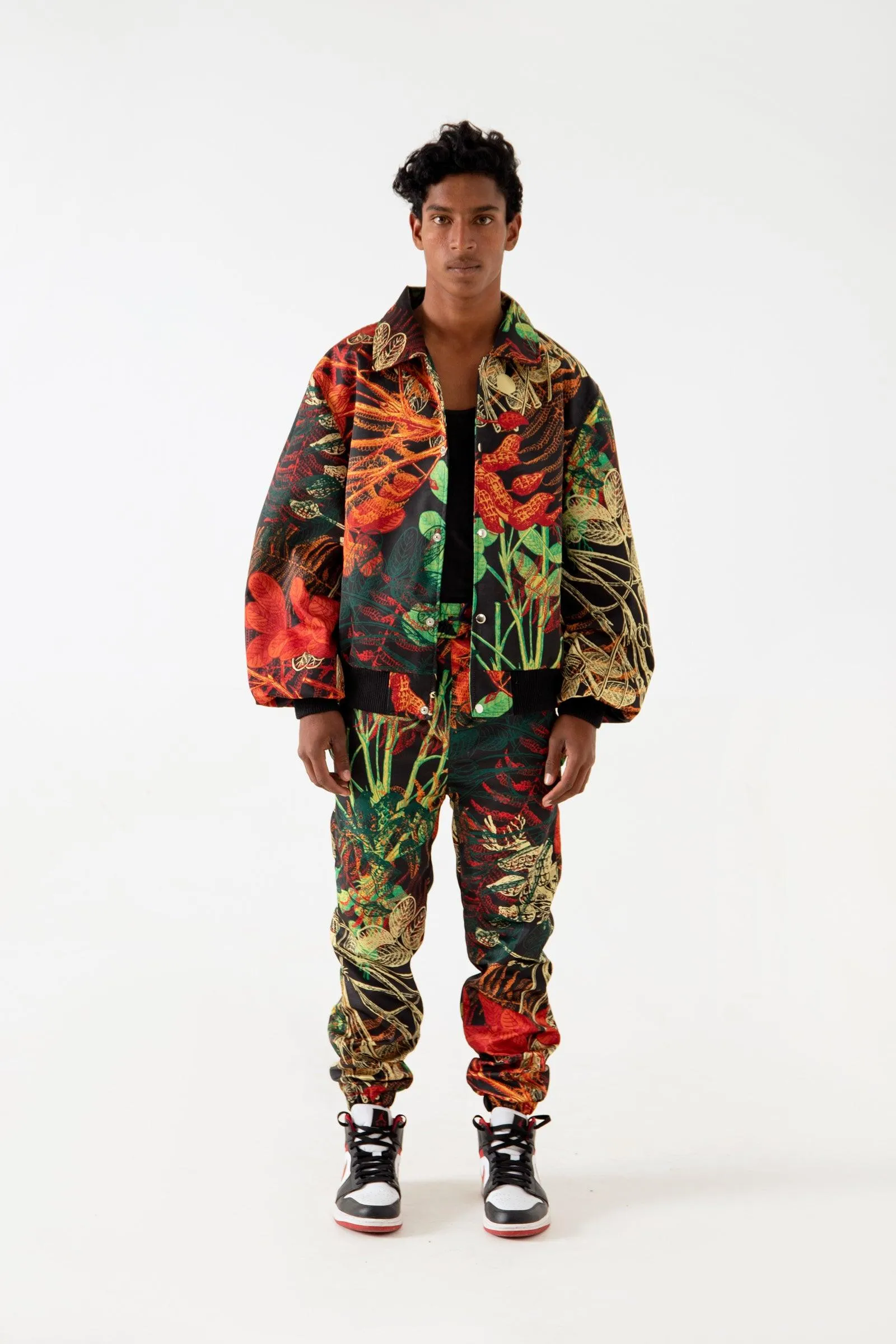 JUNGLE PRINTED SATIN SWEATPANTS