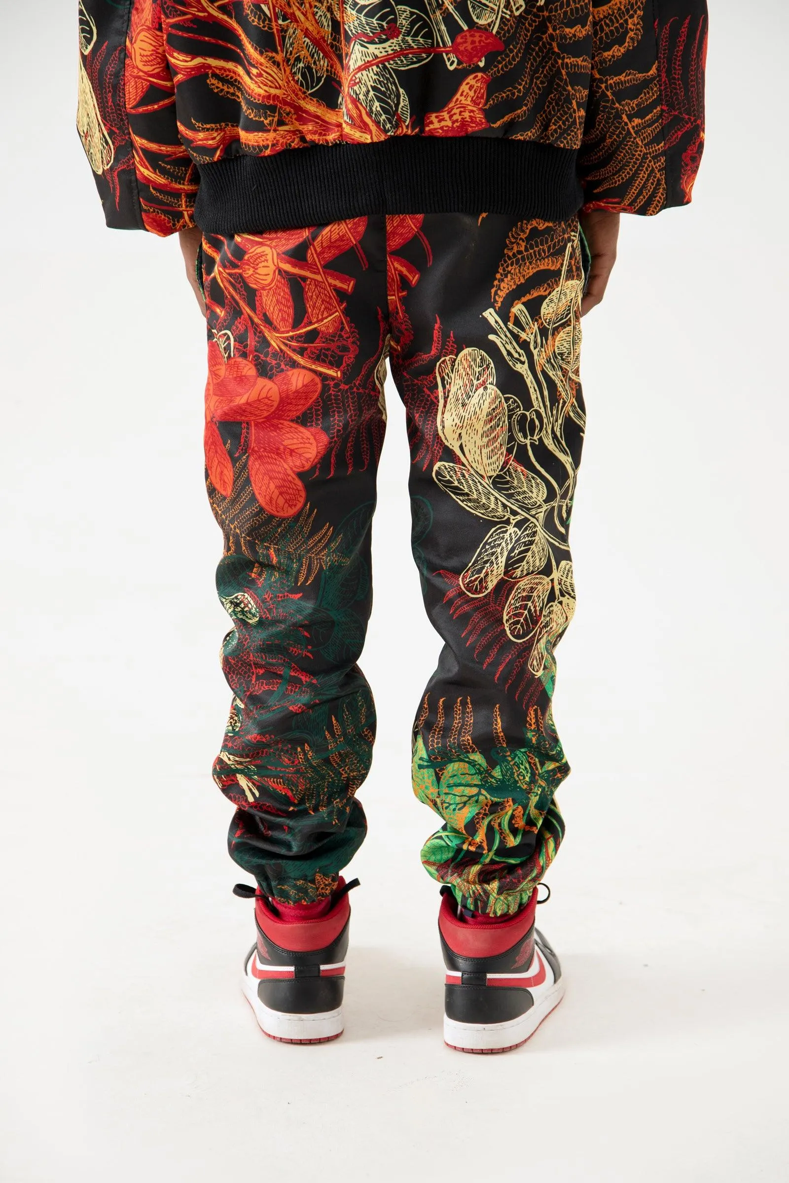 JUNGLE PRINTED SATIN SWEATPANTS