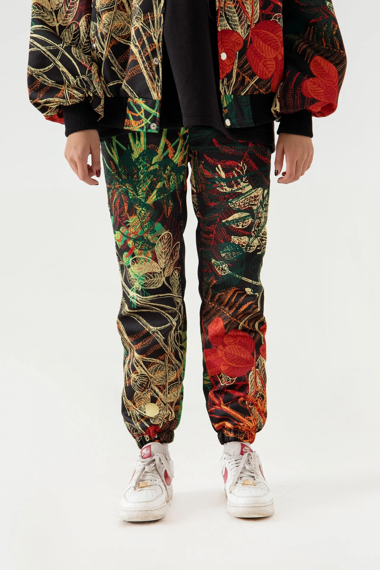 JUNGLE PRINTED SATIN SWEATPANTS