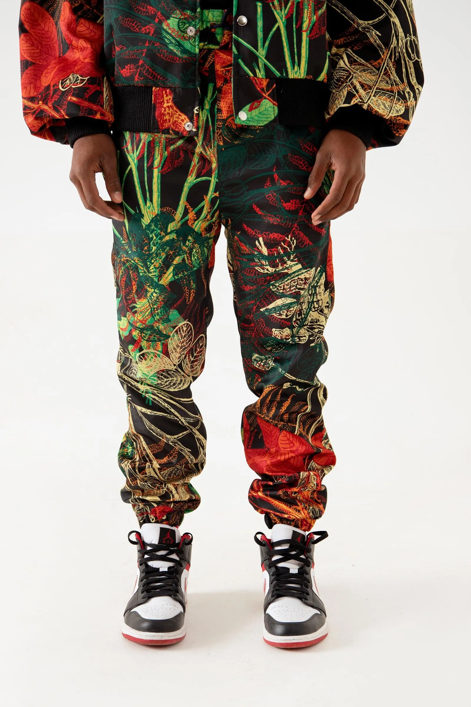 JUNGLE PRINTED SATIN SWEATPANTS