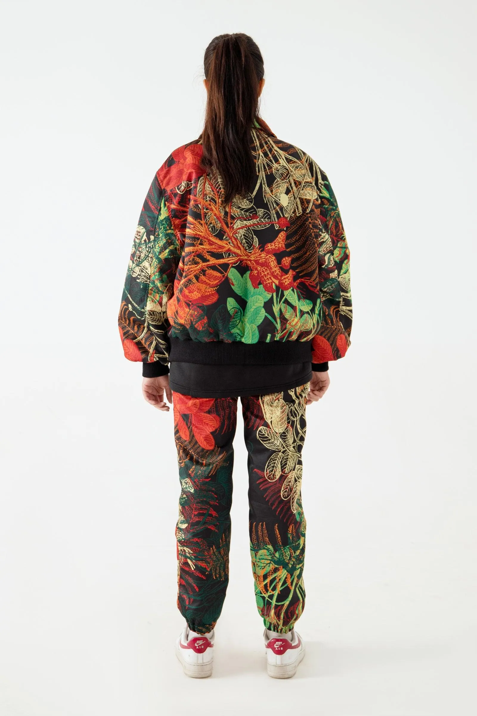 JUNGLE PRINTED SATIN SWEATPANTS