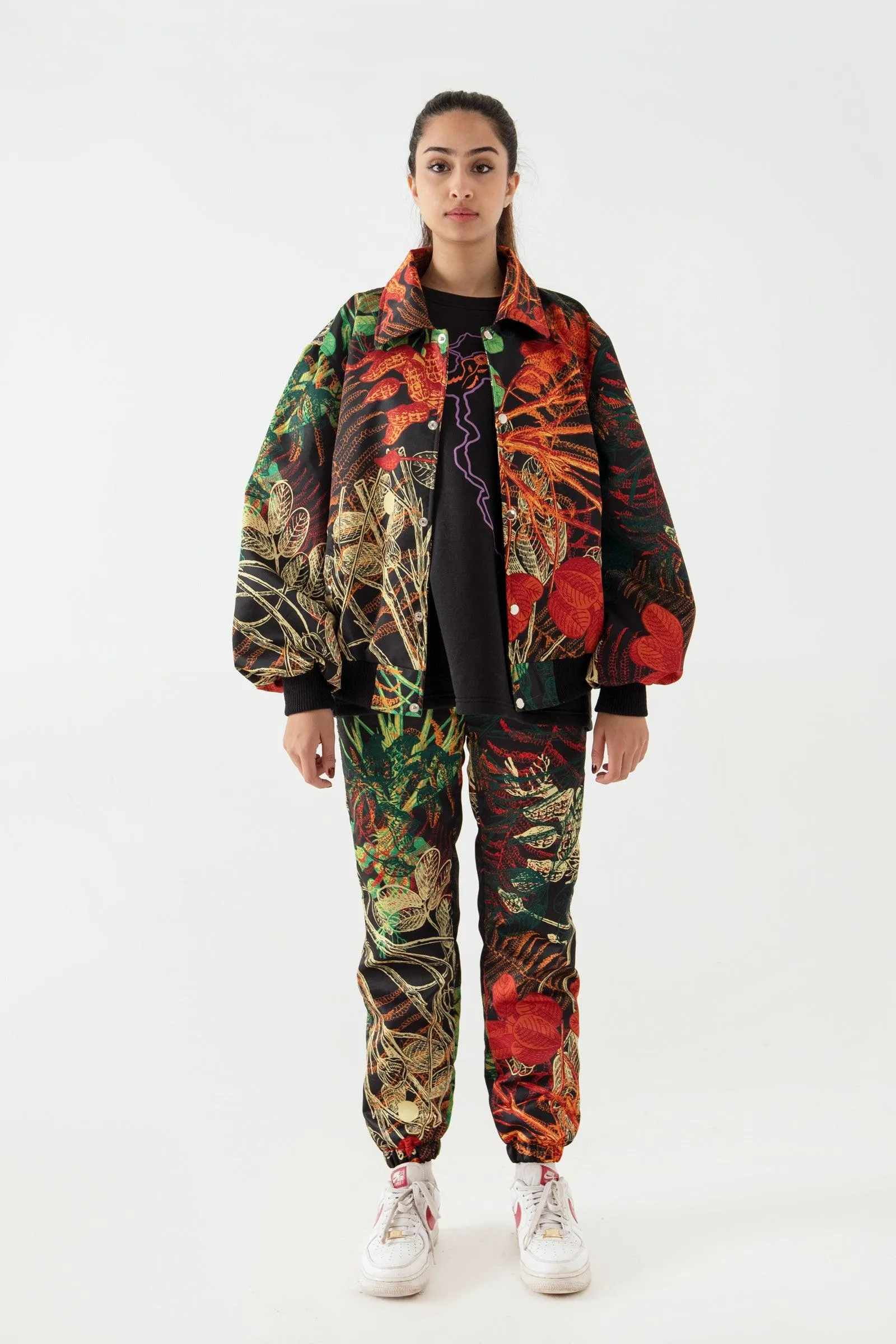 JUNGLE PRINTED SATIN SWEATPANTS